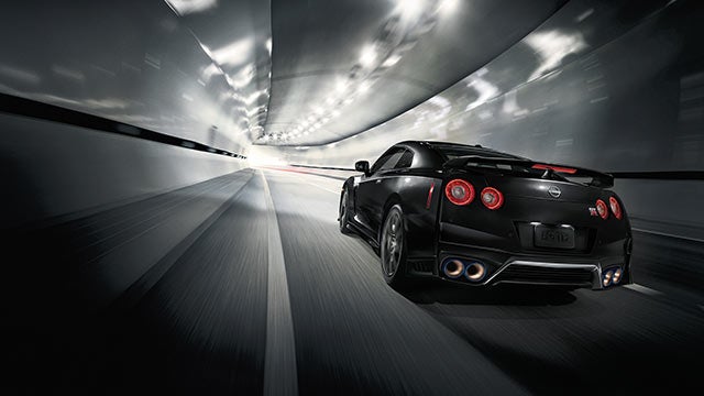 2023 Nissan GT-R seen from behind driving through a tunnel | Ted Russell Nissan in Knoxville TN